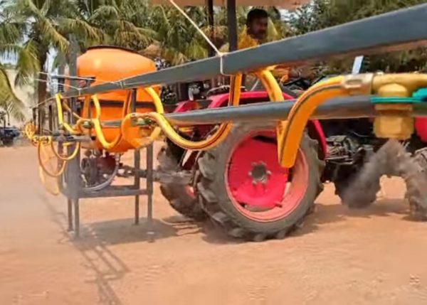 Murshid Farm Industries Implement Boom Sprayer attached to a tractor undergoing complete testing.