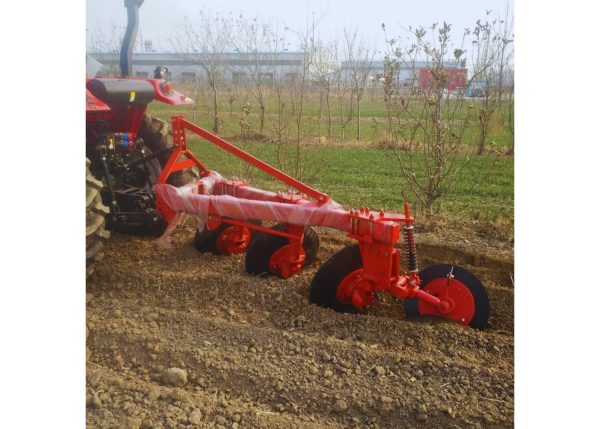 A Murshid Farm Industries Implement Disc Plough with 4 discs in operation.