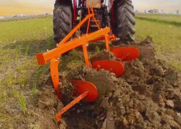 A close-up view of Murshid Farm Industries Implement Mould Board Plough with 3 blades.
