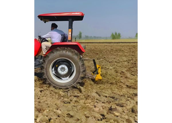 Murshid Farm Industries Implement Sub Soiler working in the farm land, side angle view.