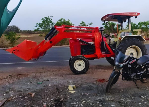 Murshid Farm Industries Implement HYDRAULIC FRONT END LOADER attached to a tractor.