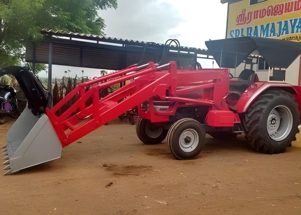 Murshid Farm Industries Implement HYDRAULIC FRONT END LOADER attached with tractor in resting position.