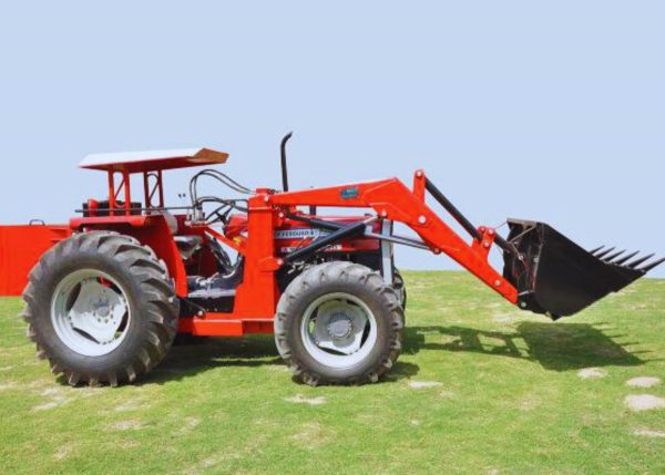 A hydraulic front end loader attached to a tractor on the right side, showcasing the equipment's features.