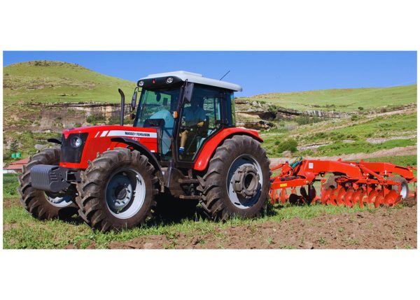 Massey Ferguson Tractor MF 455 XTRA in full view from the left side.