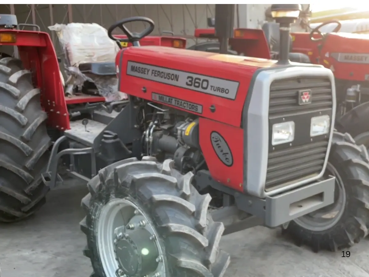 Massey Ferguson MF 360 Turbo 4WD 60HP tractor manufactured by Millat Tractors Pakistan, shown in front side view with MF grille, headlights, and 4WD tyres