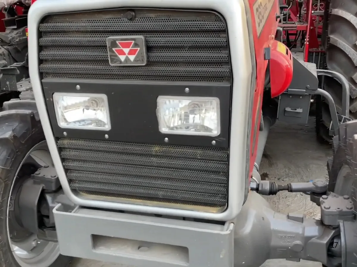 Massey Ferguson MF 360 Turbo 4WD 60HP tractor manufactured by Millat Tractors Pakistan, showing front grille, dual headlights, MF logo, and front axle