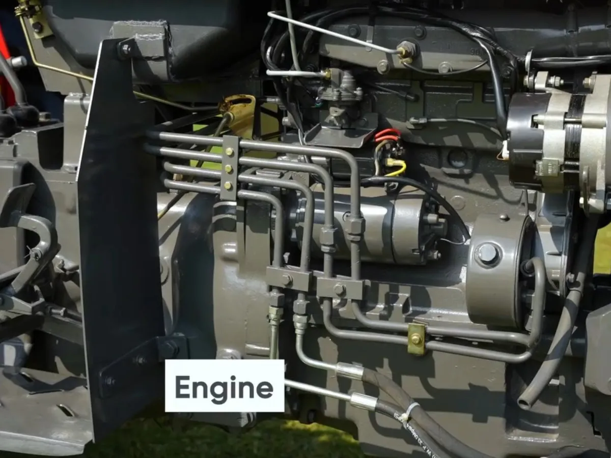Side view of Millat Massey Ferguson MF 260 Deluxe 2WD 60HP diesel engine showing fuel injection lines, engine block, and wiring system