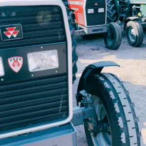 Massey Ferguson MF 385 Deluxe 2WD 85HP 2026 model front grille close up with headlights and logo