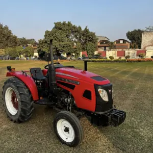 Millat MT 34-4 30HP tractor front view in field showing compact agricultural design