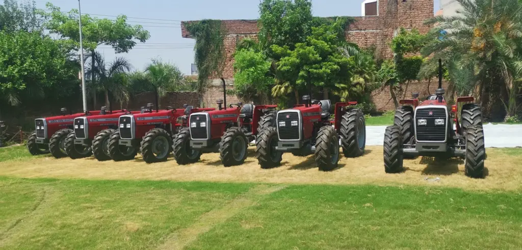 Massey Ferguson tractor lineup at MFI Red Massey Ferguson tractors lined up on the lawn at MFI