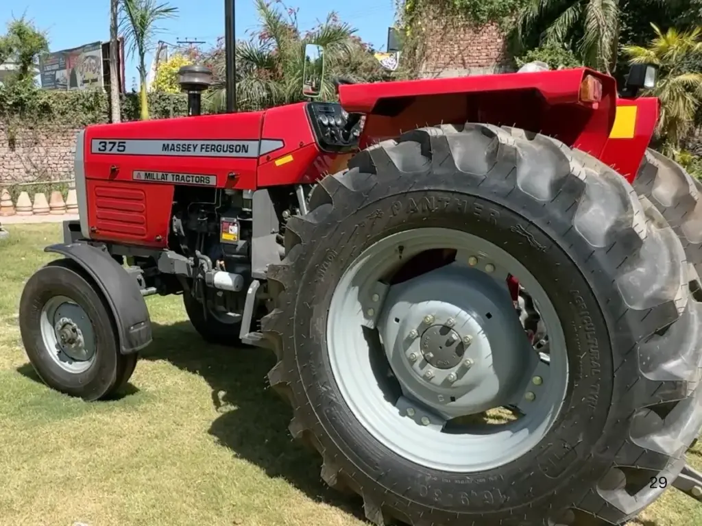 Side view of the MF 375 2WD showing its bonnet and large rear tyre