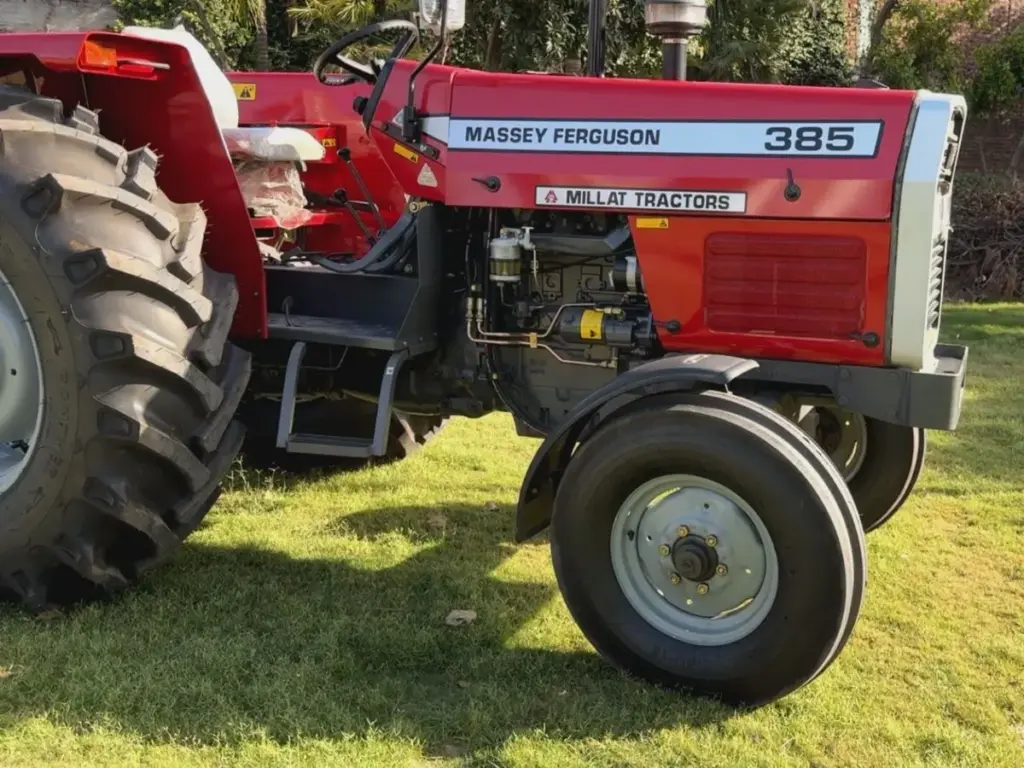 Side view of an MF 385 2WD bonnet, engine area and narrow front tyre
