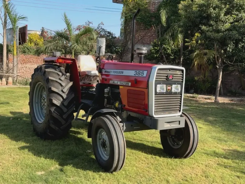 Red Massey Ferguson MF 385 2WD viewed from the front on a lawn